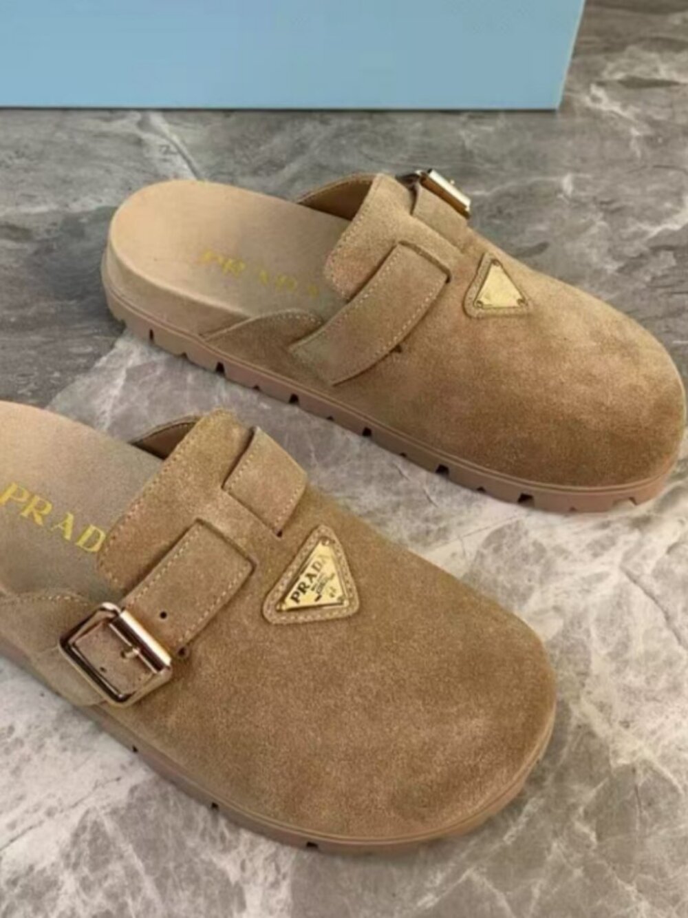 Prada Triangle Logo Buckle Mules